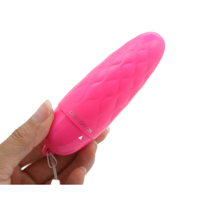 Image of the vibrator in hand. This toy is sleek, compact, and is great to bring with you while traveling for on-the-go pleasure! Enhance your next solo session today!