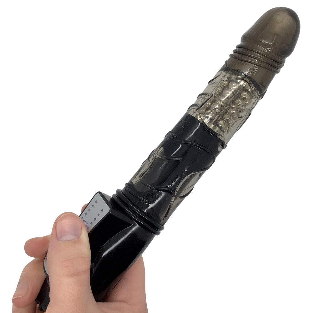 Dildo held in hand.