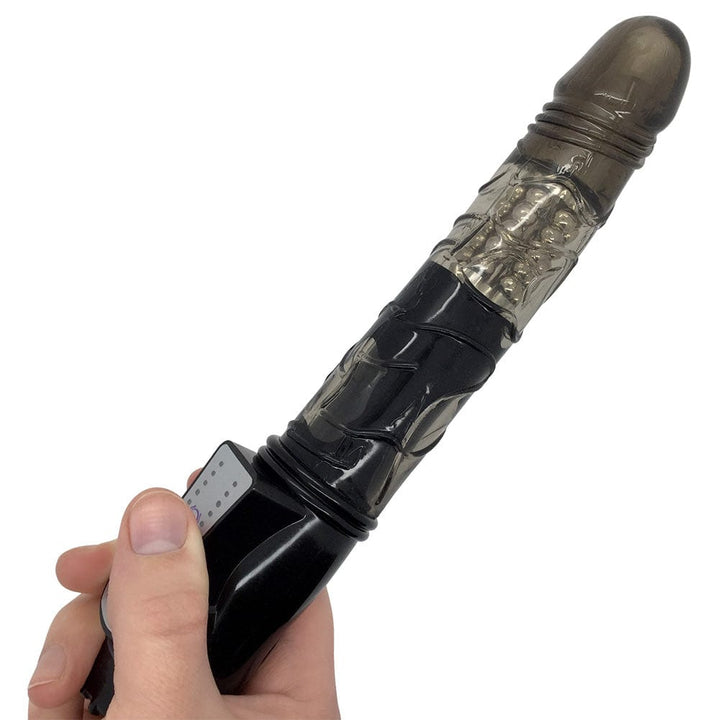 Dildo held in hand.