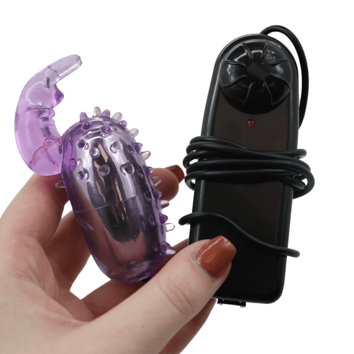 Image of hand holding the rabbit bullet vibrator.