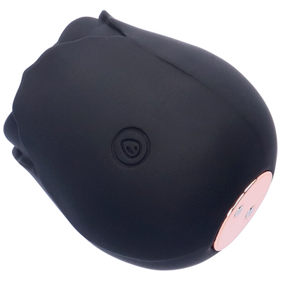 Close view of black rose air pulse stimulator power button.