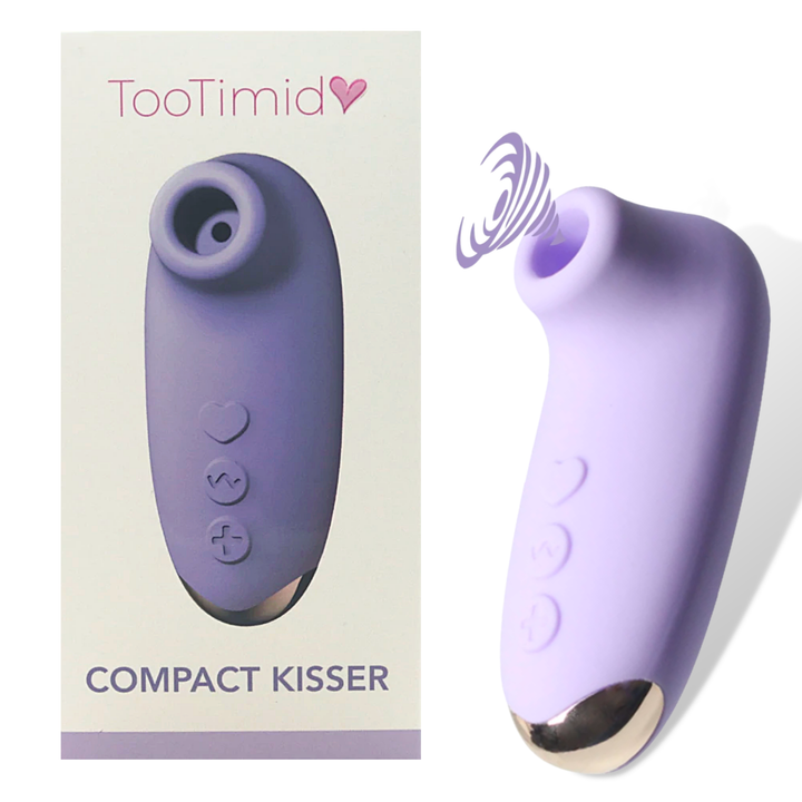 photo of the compact kisser air toy next to it's box packaging