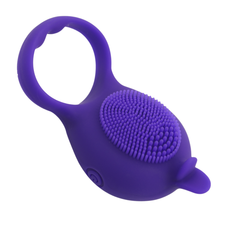 Image of the side of the cock ring! This couples toy features ticklers that stimulate the clit while in vibrates! Perfect for couples who want to enhance foreplay or penetration!