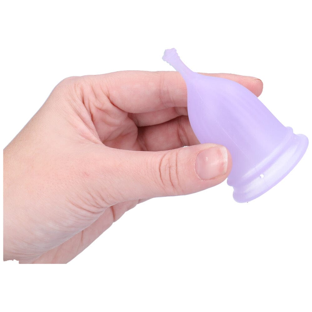 Another size menstrual cup in hand