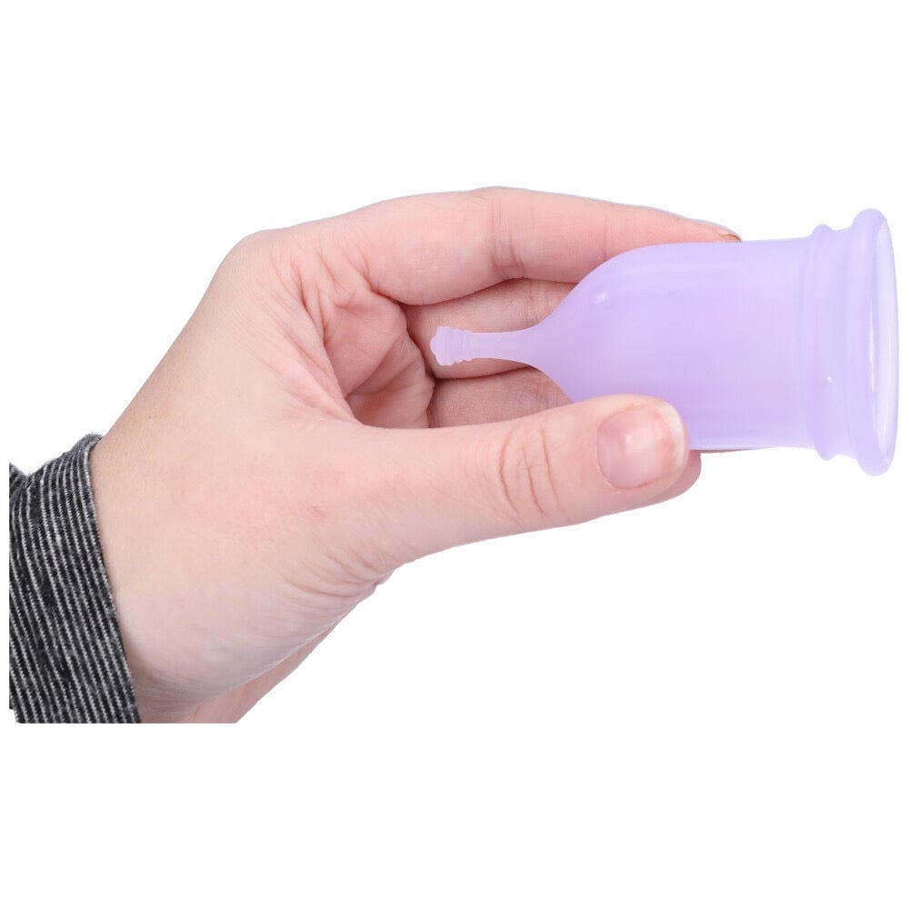 Different size menstrual cup in hand