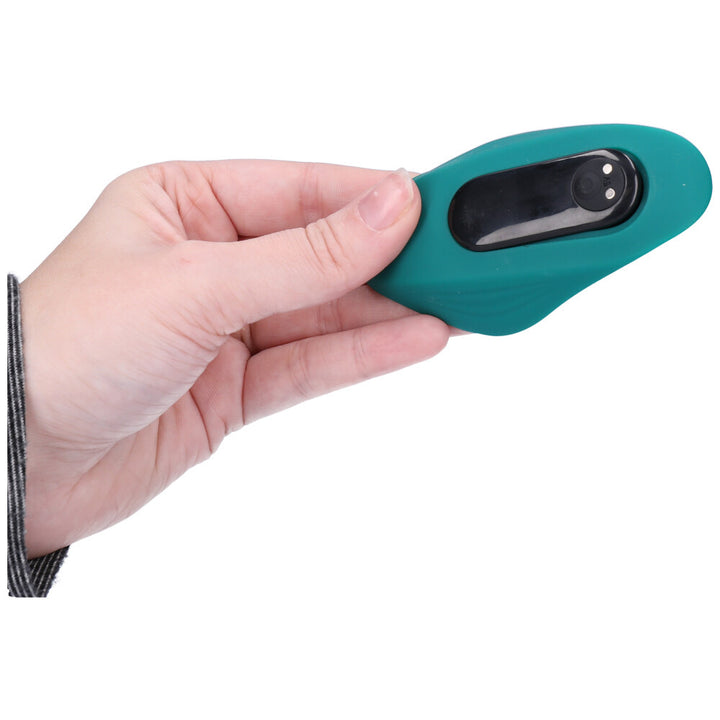 Image of the clitoral vibrator held in hand.
