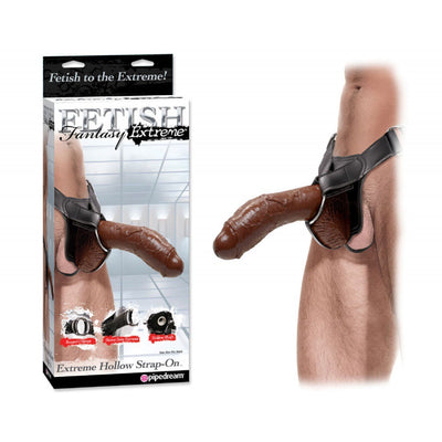 Image of the boxed packaging for this dildo and a male model shown wearing the dildo in brown