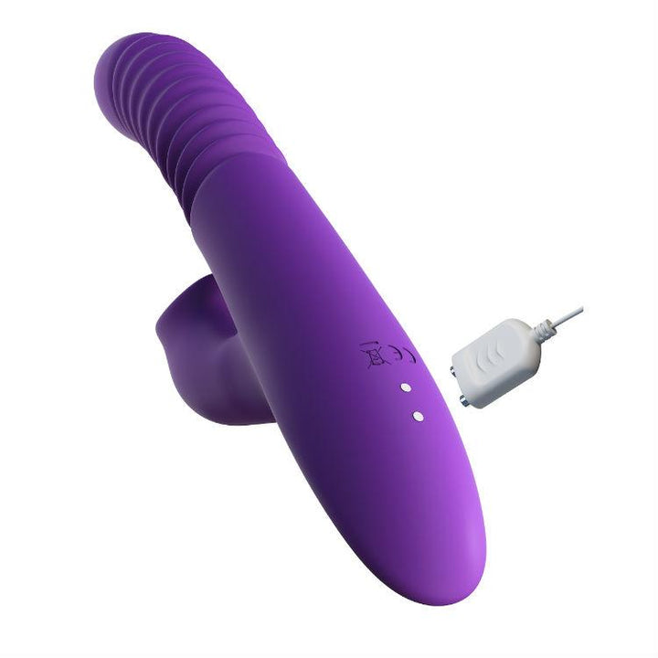 Photo of the Pipedream dual action heating and rotating vibrator with the magnetic charging cable it comes with