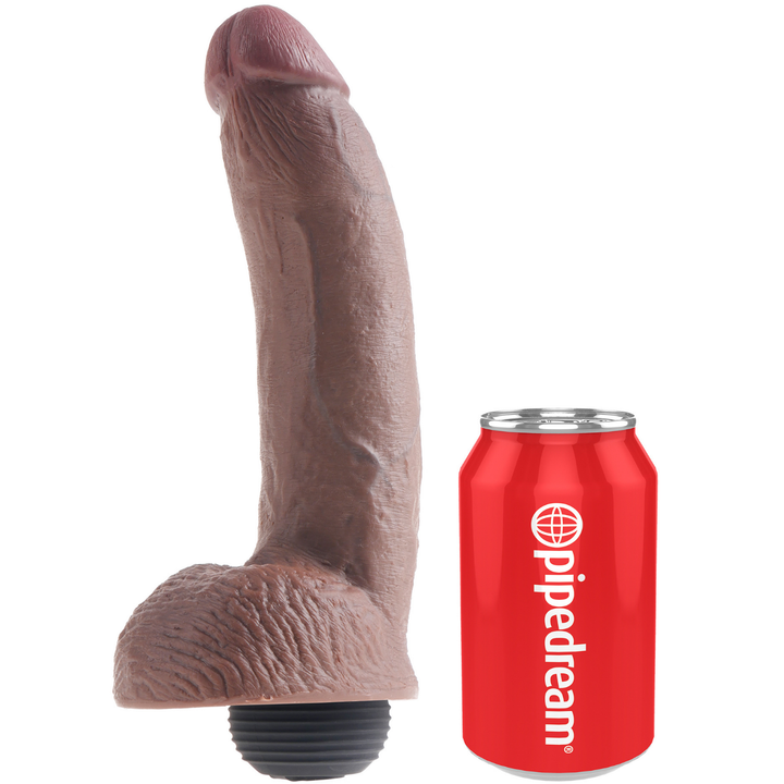 Realistic dildo shown next to soda can to shown size comparison
