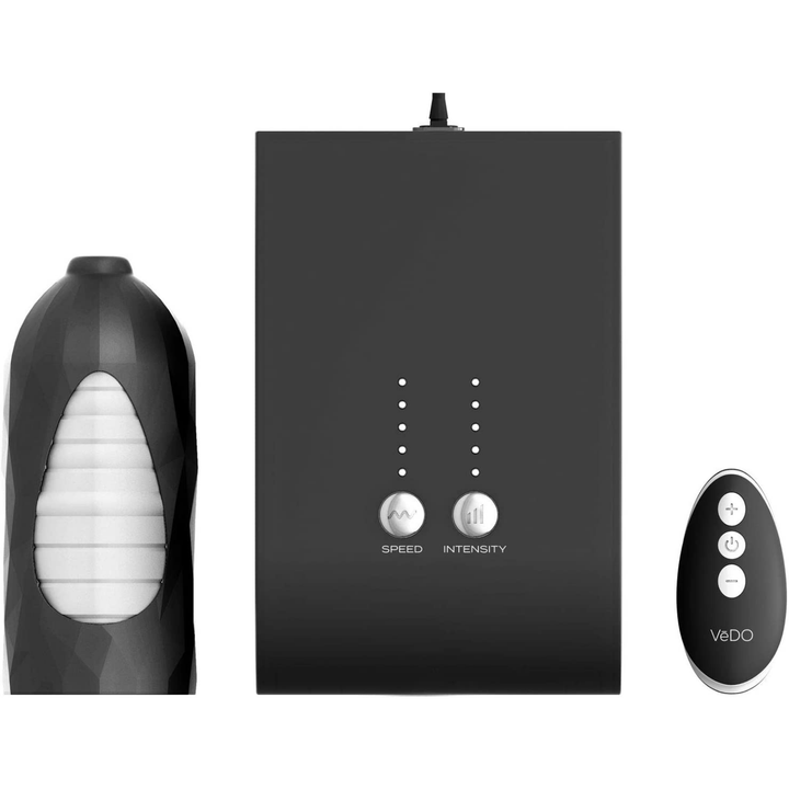 Image of the remote, machine, and suction.