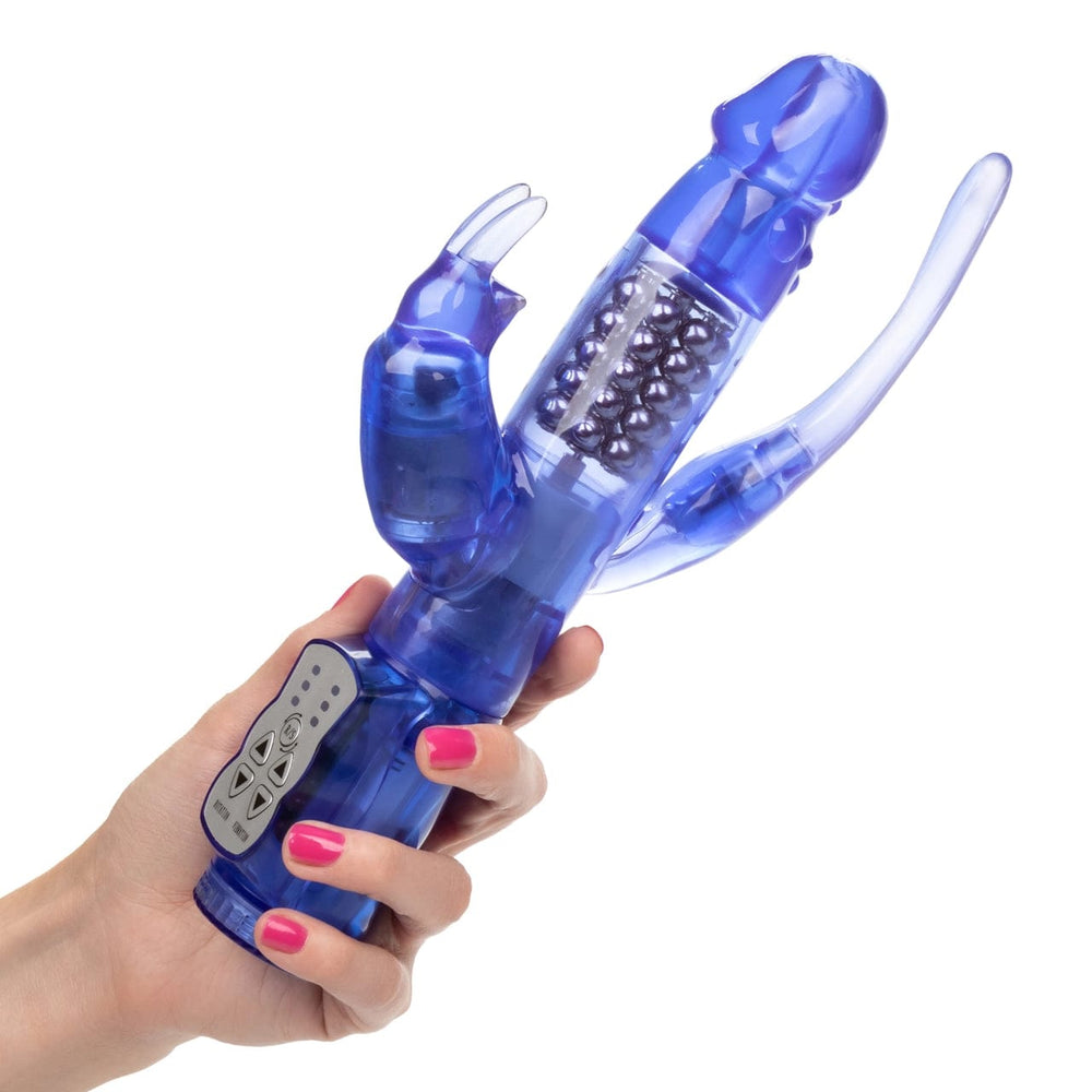 Image of a person's hand holding the CalExotics Delight Triple Orgasm Rotating Rabbit Vibrator. The easy to use control panel has a reverse rotation button, three rotation speeds and three vibration speeds.