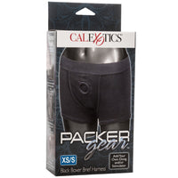 Image of the packaging for the Packer Gear Boxer Brief Harness. Text reads Calexotics Packer Gear, XS/S Black Boxer Brief Harness, Add your own dong and/or stimulator