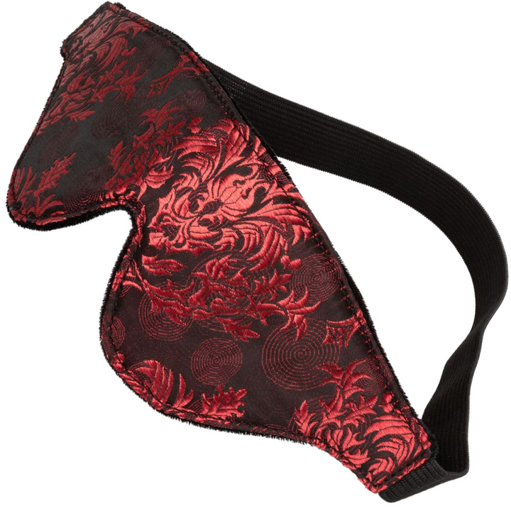 Image of the eye mask. This luxurious mask is perfect to wear during kinky foreplay with your partner! Spice things up tonight with this blackout face mask!