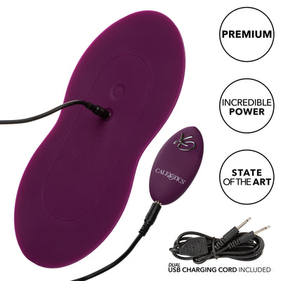 Image of the Lust Remote Control Dual Rider Hands-Free Sit On Vibrator showing the dual charging cable plugged into the vibrator and remote. Text reads premium, incredible power, state of the art, dual USB charging cord included.