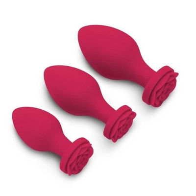 Image displays three butt bouquet plugs laying flat.