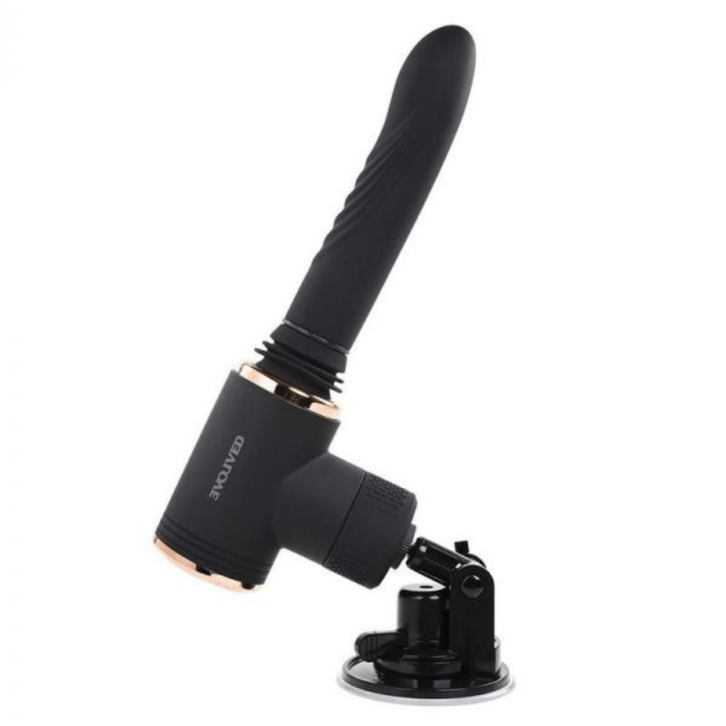 Image displays thrusting vibrator on adjustable suction cup mount from the side.
