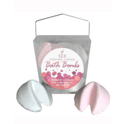 Image displays 6 sex fortune cookie bath bombs in the package with two bath bombs sitting on either side of the packaging. 