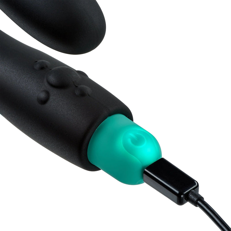 Image of the Rocker Rechargeable Vibrating Prostate Stimulator showing the included charging cable plugged in to the rechargeable bullet vibrator.