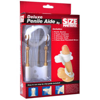 Image of the packaging for the Size Matters Deluxe Penis Enlarger System. Text reads Deluxe Penile Aide by Size Matters, includes penile device, 2 foam cushions, 2 silicone straps, 2 extender rods, 1 penis head placement brace, easy to use step by step guide included.