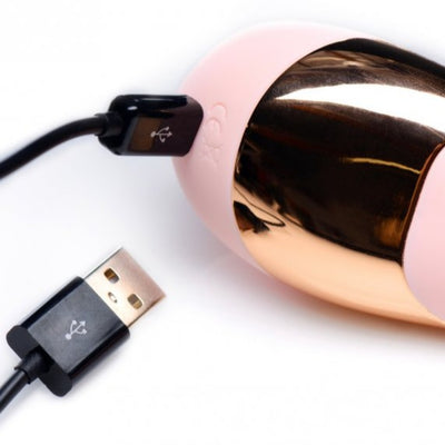 Close up image of the charging port and cord on the Shegasm Tickle Clit Stimulator