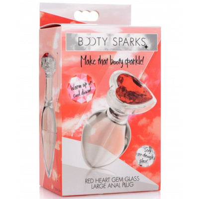 Image of the packaging for the Booty Sparks Red Heart Gem Glass Anal Plug. Text reads Booty Sparks, make that booty sparkle, warm up or cool down, sexy see-through glass, red heart gem glass large anal plug