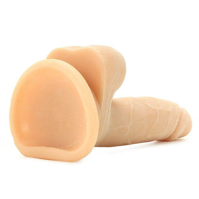 Suction cup base of beige realistic dildo