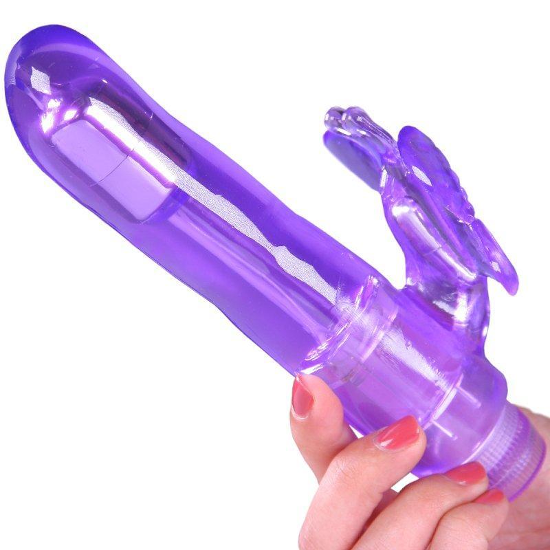 Hand Model Holding Purple Dildo