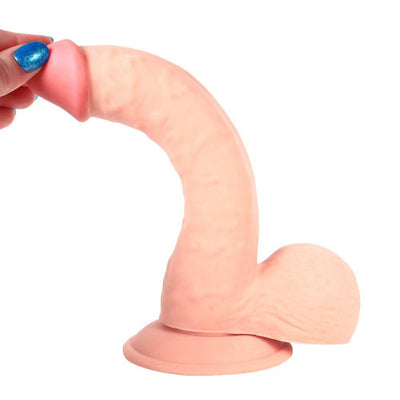 Hand Showing Flexibility of Realistic Dildo