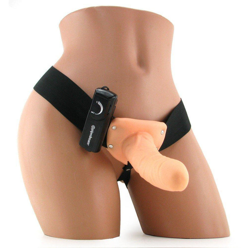 Image of mannequin wearing sex harness and realistic hollow dildo