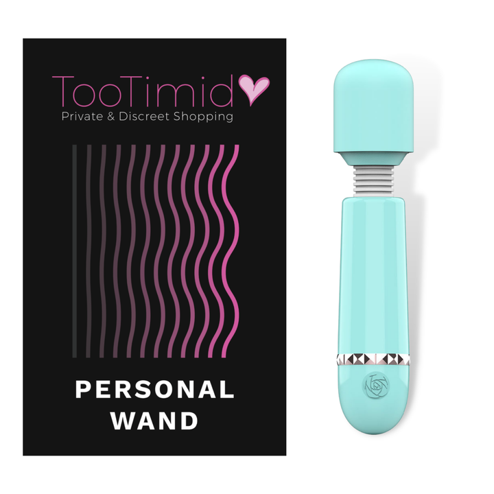 Image of the mini wand massager next to its packaging.